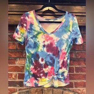 Small tie dye shirt with tie detail on bottom edge